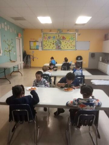 Children participating in a calm classroom routine