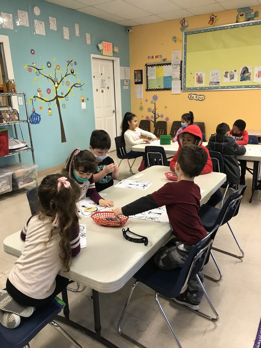 Children gathered for a small-group classroom activity